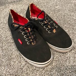 vans with leopard print trim and red interior